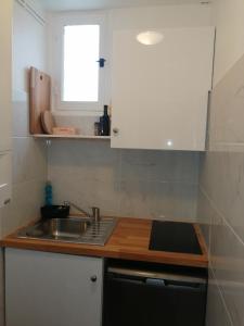 Appartements Chaleureux studio tout confort : photos des chambres