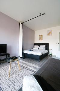 Appartements Studio cosy : photos des chambres