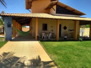 Casa de praia condomínio fechado, frente para o mar