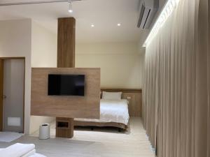 Phòng Bốn Người Có Phòng Tắm Riêng (Quadruple Room with Private Bathroom)
