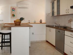 Apartment Marinella-1 by Interhome