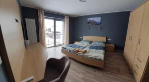 Snowhouse rodinné apartmány s balkónom 100m2