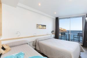 Hotels Hotel La Vigie - Face a la mer : photos des chambres