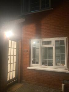 Entire Terraced two story redbrick house with parking in secluded cul de sac