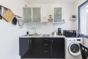 Appartements Studio spacieux a 15 min a pied de la Gare : photos des chambres