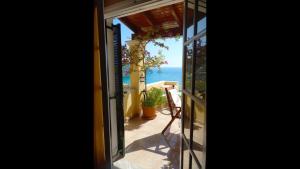 Natalia Apartment A with panoramic sea views of Agios Gordios bay