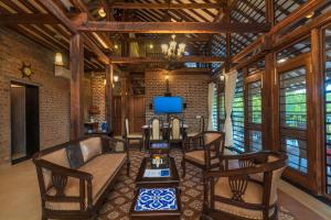 SaffronStays Vedika - 4BR riverfront pool villa with kaya king bullock ride & BBQ near Pinjal River, Vikramgad