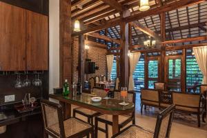 SaffronStays Vedika - 4BR riverfront pool villa with kaya king bullock ride & BBQ near Pinjal River, Vikramgad