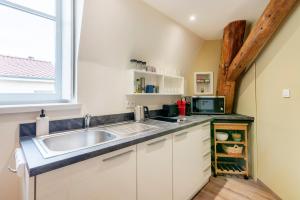 Appartements Le Clocher de Saint-Epvre : photos des chambres