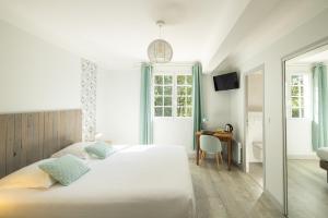 Hotels LOGIS Hotel St Sylvestre : photos des chambres