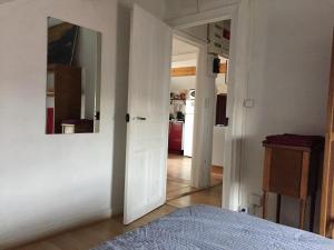 Appartements Sous Les TOITS ARVERNE : photos des chambres