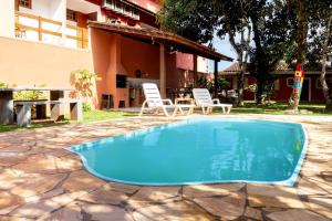 Casa com piscina a 350m da praia em Boiçucanga