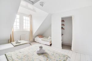 Appartements NOCNOC - Le Magnifique : photos des chambres