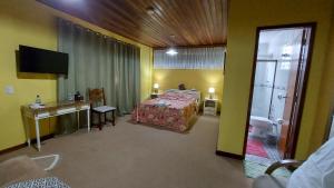 Suíte com vista da Serra