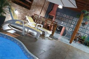 Casa na Praia do Sonho com Piscina e Jardim.