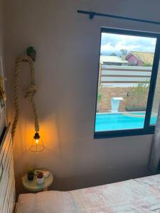 Casa na Praia do Sonho com Piscina e Jardim.