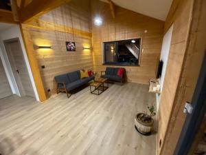 Les Chalets des Capucines & Jacuzzi privatif : photos des chambres