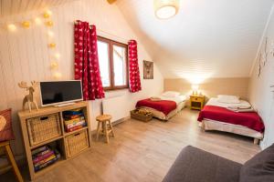 Chalets Le Bois des Neiges Charmant chalet authentique a 5 mn de Gerardmer : photos des chambres