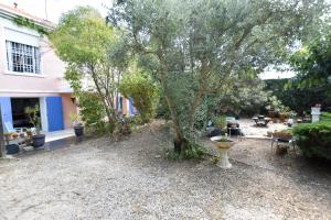 Appartements Moulin Rose - Location avec jardin et parking : photos des chambres