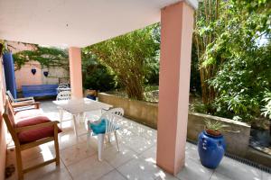 Appartements Moulin Rose, Parking - Jardin : photos des chambres