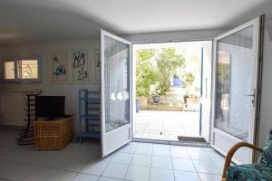 Appartements Moulin Rose, Parking - Jardin : photos des chambres
