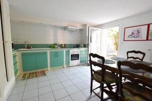 Appartements Moulin Rose, Parking - Jardin : photos des chambres