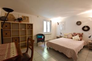 Appartements Moulin Rose, Parking - Jardin : photos des chambres