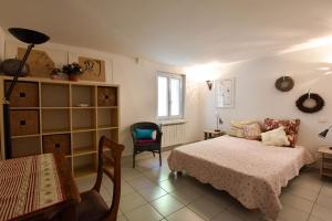 Appartements Moulin Rose - Location avec jardin et parking : photos des chambres