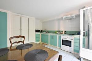 Appartements Moulin Rose - Location avec jardin et parking : photos des chambres