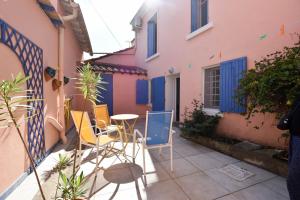 Appartements Moulin Rose - Location avec jardin et parking : photos des chambres