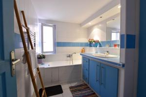 Appartements Moulin Rose, Parking - Jardin : photos des chambres