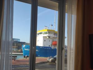 Appartements LE WELCOME vue port appartement plain pied : photos des chambres