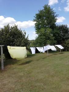 Appartements Le Pot au Lait - FIBRE - CLIMATISATION : photos des chambres