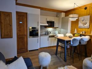 Appartements Arc 1950 Appartement de standing Refuge du Montagnard, vue incroyable sur le Montblanc, skis aux pieds Acces spa et piscine : photos des chambres