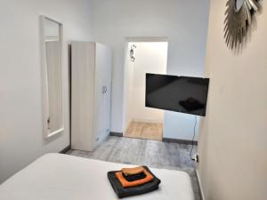 Chambre 26m - Salon et kitchenette privé - WIFI
