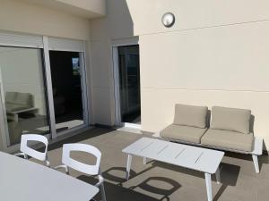 Ático con terraza y vistas al mar - Playa tranquila - Oliva