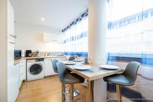 Appartements Le BLUE BAY--T2--TOUT CONFORT--HYPER CENTRE--WIFI : photos des chambres