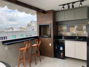 Duplex na orla da praia do forte, banheira e Wi-Fi