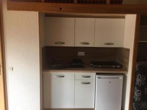 Appartements Charmant studio avec piscine . : photos des chambres