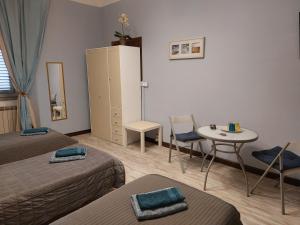 Camera Tripla con Bagno in Comune
