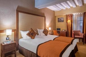 Hotels Hotel Saint Honore 85 : photos des chambres