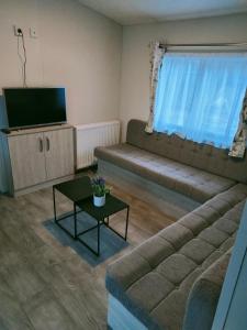 BJ Chalets - De Rug 1 - Vakantiepark Lauwersoog - LUXE chalet met vaatwasser! Vroege incheck!