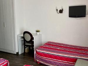 Hotels Le Catinat Fleuri : photos des chambres