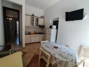 Apartments Lalić - Two bedroom ground floor apartment close to the beach