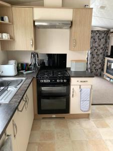 Mollys Retreat pet friendly three bed caravan with small garden Newquay Bay Resort Quieter area of park