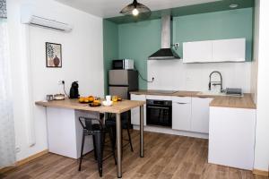 Appartements Cosy Green Clim Wifi Centre ville 2 pers : photos des chambres