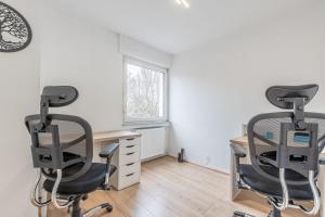 Appartements Les Trois Frontieres : photos des chambres