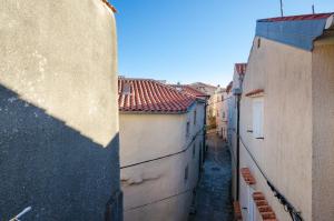 Under Ancient Roofs Vrbnik