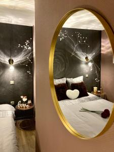 Appartements SUITE KASSIOPEE, romantisme, balneo, sauna : photos des chambres