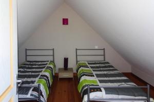 Maisons de vacances Cottage, Guerlesquin : photos des chambres
